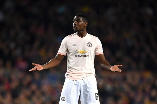 Paul Pogba of Manchester United reacts during the UEFA Champions League Quarter Final second leg match between FC Barcelona and Manchester United at Camp Nou on April 16, 2019 in Barcelona, Spain. (Photo by Matthias Hangst/Getty Images)