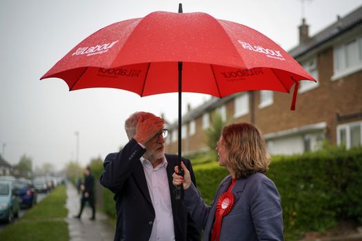 British Labour Party leader Jeremy Corbyn and local election Labour candidate Mandy Clare take part in local election campaigning with activists in Cheshire on April 16, 2019 in Winsford, England. During local election campaigning Jeremy Corbyn earlier called for investment in local policing as he discussed rising crime in the local area with residents. (Photo by Christopher Furlong/Getty Images)