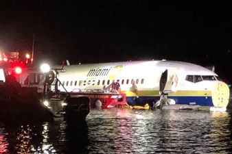 Boeing 737 skids into river after attempting to land during thunderstorm