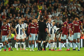 Jonathan Kodjia dabs Chris Brunt down the tunnel after red card