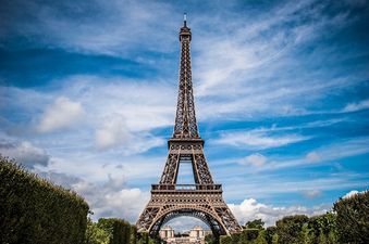 Eiffel Tower evacuated after man spotted climbing up the side