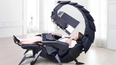 This robotic scorpion gaming chair has a massage seat and can support up to three monitors