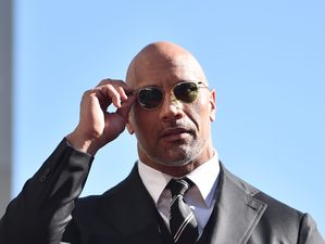 The Rock rips security gate off his wall after he gets trapped inside