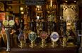 Greene King to close dozens of pubs and cut 800 jobs as curfew cripples industry