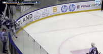 Ice hockey player celebrates so hard they smash through glass wall