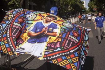 Funeral parlour workers pose with Diego Maradona’s body in coffin