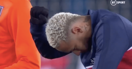 PSG and Basaksehir players take a knee ahead of their delayed Champions League fixture