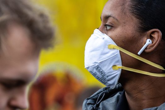 A woman wears a face mask to protect her from coronavirus