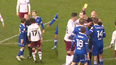 Referee squares up to Ipswich Town player in bizarre altercation