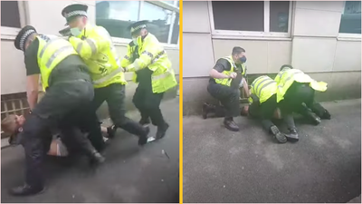 Police to investigate after video emerges of officer appearing to punch Man United fan