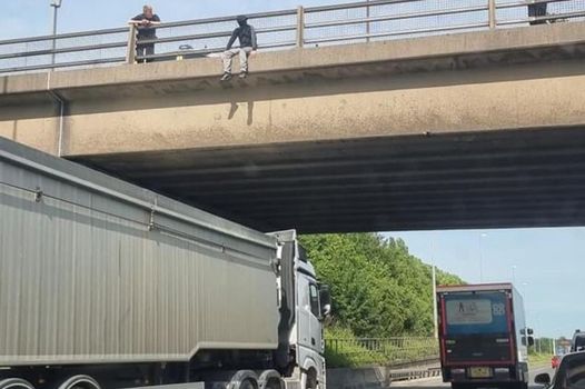 Trucker saves man by parking lorry underneath M62 bridge