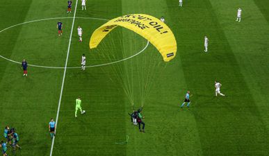 Greenpeace protestor almost parachutes into crowd at Germany vs France game