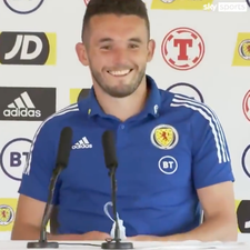 John McGinn asks for a bottle of Coke at Euros press conference