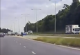 WATCH: Staggering moment police pull over man on e-scooter trying to join motorway