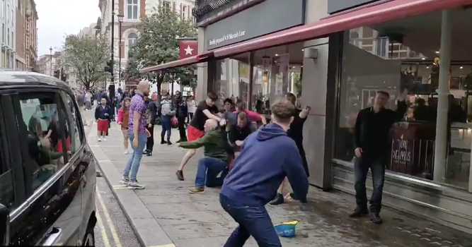 England and Scotland fans fight in London street