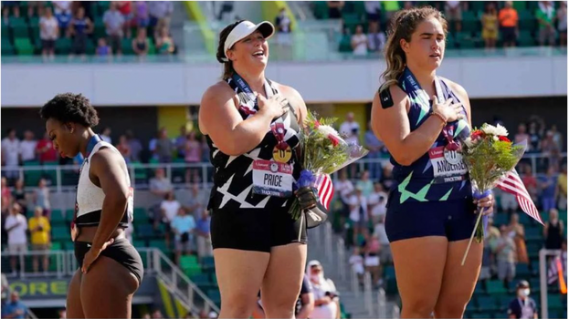 Gwen Berry turns back during the national anthem