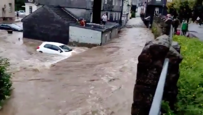 At least 21 dead and dozens missing as floods rip through Germany