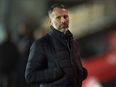 Ryan Giggs accused of kicking ex in back and throwing her naked out of hotel room