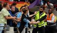 Man City fans seen tearing down rainbow banner at Spurs ground and invading pitch