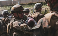 Baby seen lifted over Kabul airport fence reunited with dad