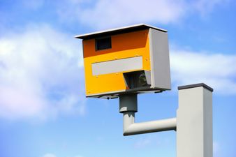 Man filmed climbing into speed camera and flashing drivers with phone