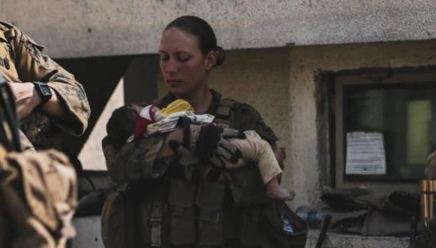 US marine shares post just days before her death of her caring for Afghan children