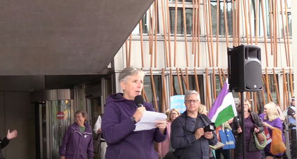 Anti-trans protesters wearing suffragette colours boo Nicola Sturgeon