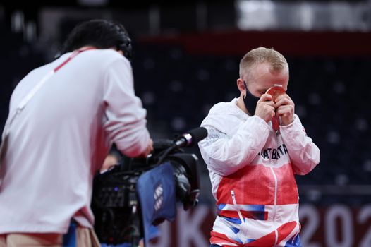 Krysten Coombs with his bronze medal, as Team GB finish second in the medal table at the Paralympics