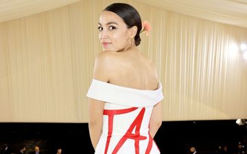 AOC makes statement with bold gown at Met Gala