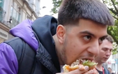 Man eats ‘world’s biggest burger’ in front of vegan protestors