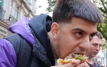 Man eats ‘world’s biggest burger’ in front of vegan protestors