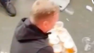 Guy seen carrying 48 beers in one go at football match