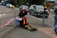 Insulate Britain protestor tied to railing with own banner by angry driver