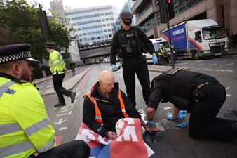 Insulate Britain protestors glue themselves to ground to prevent police arrest