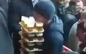 Guy seen carrying 64 pints to mates at football match