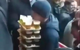 Guy seen carrying 64 pints to mates at football match