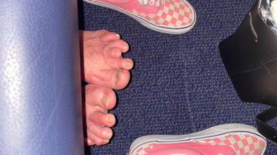 Internet disgusted at sight of bare feet sticking out under plane seat