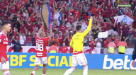 Internacional players lift fake coffins after beating rivals Gremio in derby match