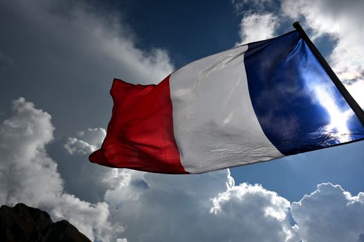 Macron changes colour on French flag