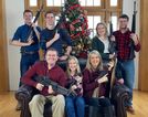 Congressman and family pose with guns for Christmas photo days after school shooting