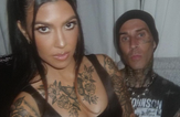 Kourtney Kardashian seen with body covered in tattoos as she poses with Travis Barker