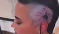 Demi Lovato tattoos giant spider on their head