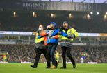 Everton fan storms pitch at Carrow Road to confront Rafa Benitez