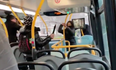 Passengers look on as schoolboys launch knife fight on top of bus in shocking footage