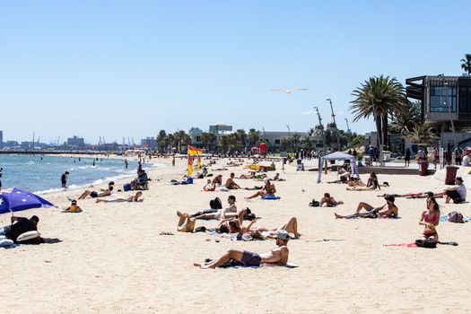 A general view of St. Kilda beach on Christmas Eve on December 24, 2021 in Melbourne, Australia. Victoria has reintroduced rules for masks to be worn in indoor settings, as COVID-19 case numbers continue to rise. From 11:59pm on Thursday 23 December, all Victorians aged 8 and up are required to wear a mask in all non-residential indoor settings. Masks must also be worn while moving around at major events attracting at least 30,000 people, but can be taken off by patrons while sitting down.