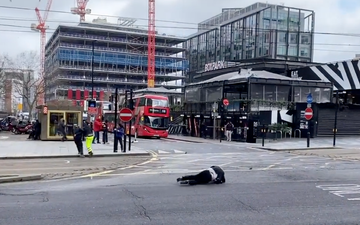 Shocking moment people get thrown into traffic by strong winds during Storm Eunice