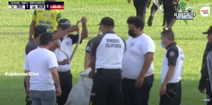 Snake brings football match to a halt in Guatemala after invading pitch