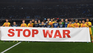 Barcelona and Napoli players reveal banner reading ‘Stop war’ before Europa League fixture