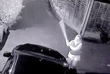 CCTV shows drunk woman smash neighbours’ cars with 3ft pick-axe handle over parking row