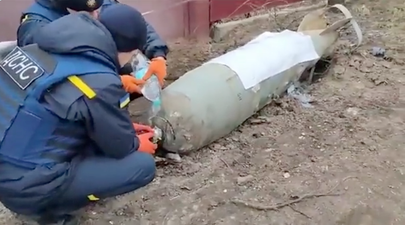 Heart-stopping video shows Ukrainians disabling bomb with bare hands and water bottle